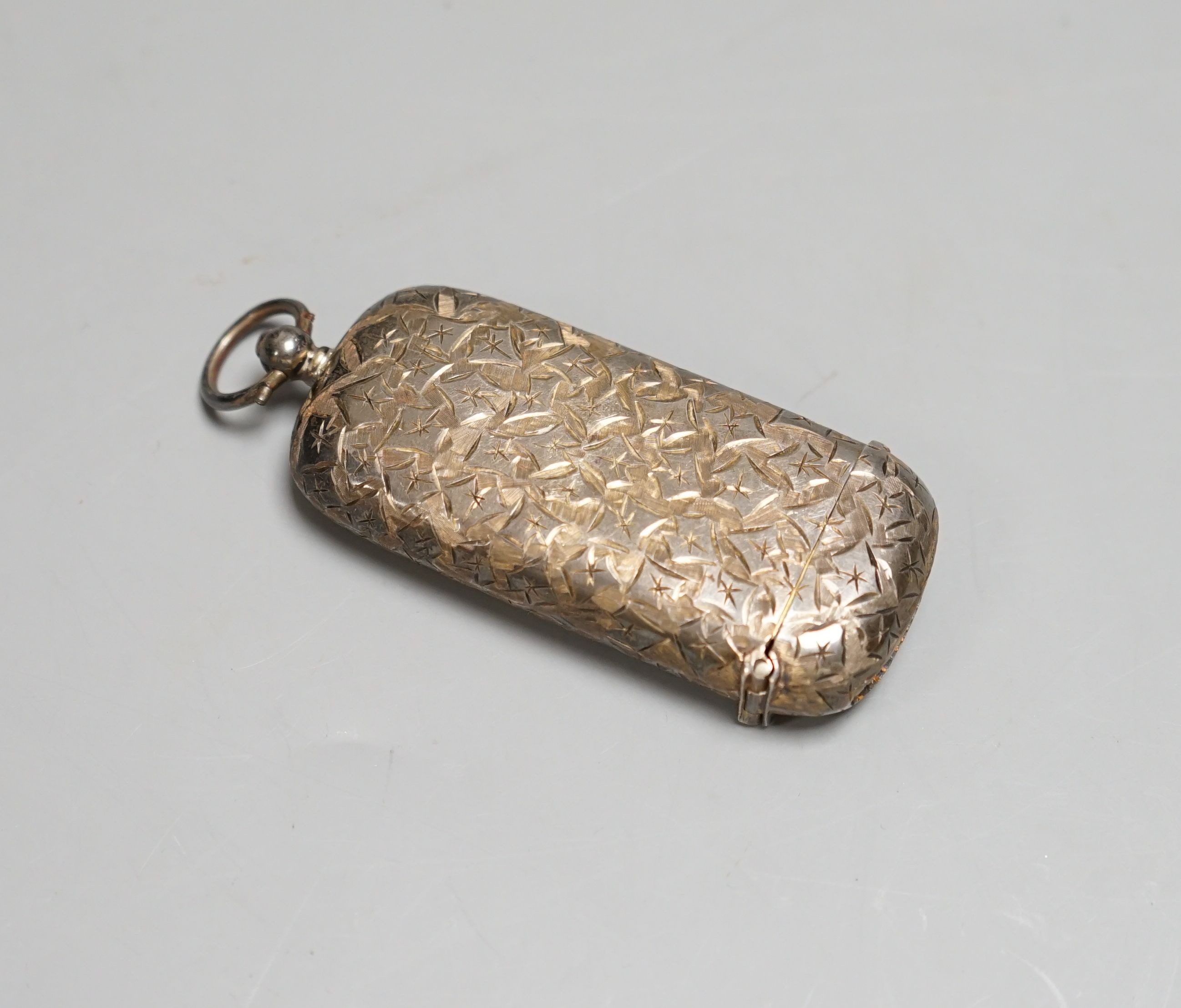 An Edwardian engraved silver combination vesta and sovereign case, Birmingham, 1903, 67mm.